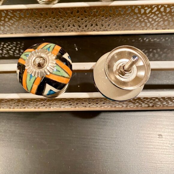 Many new sets of 6 black/orange ceramic pull/knobs - Picture 4 of 6